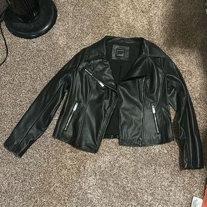 New Faux leather jacket size Large bought at a boutique